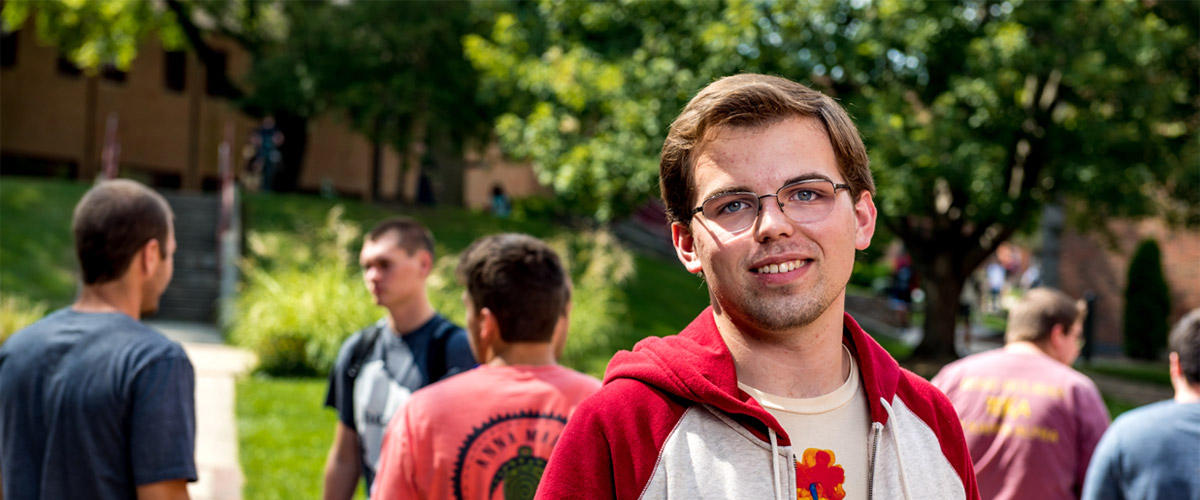 Jake standing in Root Quad